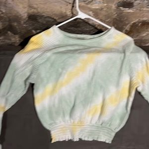 Green and white stained sweater